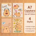 Lindo mini cuaderno Capybara A7, juego de papelería de 16 hojas y 32 páginas rayadas - Diseños de Capibara Aleatorios / 1 Unidad (Aproximadamente 82x120mm)