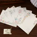 Elegante papelería vintage con motivos florales de acuarela para cartas y mensajes - Conjunto Floral Corazón Cálido