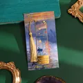 Gilded metal bookmark featuring Claude Monet Impression Sunrise art with a gold tassel - Morning Light (Impression Sunrise)