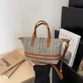 Minimalist woven hollow-out crossbody bag with brown leather straps and silver chain - Brown