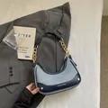 Elegant blue denim color-block shoulder bag with chic gold chain strap for women - No Pendant / Blue