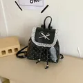 Süßer schwarzer Polka-Dot-Rucksack für Mädchen mit weißer Spitze und eleganter Schleife - Schwarz