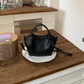 High-end commuter bucket bag in black crinkled texture with top handles for women - Standard Type / Black