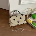 Chique beige en zwarte polka dot mini crossbodytas met zilveren ketting en handvat - Khaki