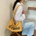 Spacious yellow nylon tote bag with off on Weekends text for casual daily travel - Yellow