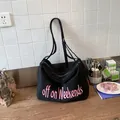Black lightweight nylon tote bag with pink 'off on Weekends' embroidery - Black