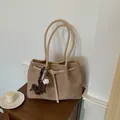 High-end women's commuter tote bag in oatmeal beige featuring a cute dog charm - With Dachshund Pendant / Khaki