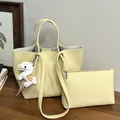 Elegant yellow pebbled leather tote bag with matching pouch and white horse charm - Tote Bag Set (Includes Pouch & Charm) / Yellow