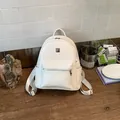 Fashionable white woven textured backpack for women, ideal for daily commute and travel - White (Without Charm) / White