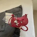Red polka dot shoulder bag with decorative bow and silver balloon dog charm - With Pendant / Burgundy