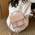 Elegant pink lightweight women's satchel backpack with cute heart patterns for travel - Pink