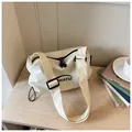 Minimalist cream grid canvas crossbody bag with adjustable strap for daily commuting - No Pendant / White