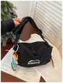 Stylish black checkered canvas crossbody bag with adjustable strap and cute pendant - With Charm / Black