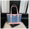 Chic large denim tote bag for women featuring stylish pink faux leather trim and handles - No Pendant / Pink