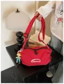 Red checkered canvas crossbody bag for women featuring a stylish white BANATU logo - With Charm / Red