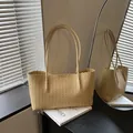Handmade woven tote bag in light yellow with scalloped edges and long straps - Yellow