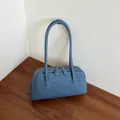 Stylish blue denim textured Boston pillow bag with long shoulder straps for trendy women - Dark Blue