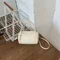 Elegant cream cylinder barrel handbag for women with adjustable crossbody shoulder strap - Standard Type / White