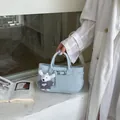 Premium light blue leather handbag with cute rabbit charm for women - Blue With Pendant
