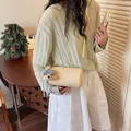 Stylish yellow cylindrical crossbody bag for women featuring a cute plush bear charm - With Bear Pendant / Yellow