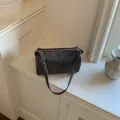 Elegant charcoal grey minimalist pillow bag crossbody shoulder purse for women 2026 - Black