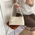 Chic beige woven hobo underarm bag with single strap for summer fashion - White