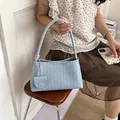 Elegant light blue hand-woven underarm shoulder bag for women summer fashion accessory - Blue