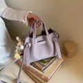 Sac cabas élégant en cuir texturé lavande avec design à nœuds et breloque lapin - Violet avec Pendentif / Violet