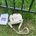 Cream lightweight nylon mini crossbody bag with rope handles for outdoor travel. - White Small