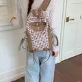 Lightweight brown checkered backpack for students and travel with simple aesthetic - Brown Grid
