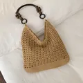 Handcrafted woven straw beach tote bag featuring a unique decorative wooden bead handle - Khaki (Single Bag)