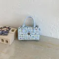 Elegante bolso tipo bauletto azul claro con lunares, lazo y colgante de corazón charm - Estilo Sin Colgante (JY1523) / Azul