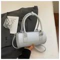 Elegant light blue cylinder handbag with star pattern, stylish lady's crossbody pillow bag - Regular Fit / Blue