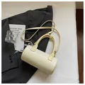 Elegant cream white cylindrical handbag with star texture, top handle and long shoulder strap - Regular Fit / Yellow