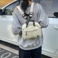 Compact cream multi-functional women's backpack perfect for outdoor cycling and hiking trips - Silver Large