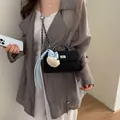 Trendy black quilted mini crossbody square bag with a cute poodle charm and chain strap - With Pendant / Black