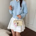 Elegante bolso de mano de lunares crema para mujer con dije de conejo de peluche - Con Colgante de Conejo (JY1523) / Amarillo