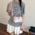 Bolso cilíndrico rosa de lunares con colgante de conejo, bolso bandolera moderno - Con Colgante de Conejo (JY1523) / Rosa
