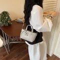 Minimalist beige commuter bucket bag for women with decorative horse charm pendant - With Keychain / Off White