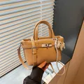 Elegant tan faux leather mini bucket handbag with horse charm and adjustable strap - With Keychain / Khaki