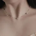 Elegant gray pearl necklace on 18k gold plated stainless steel chain detail view - Grey Pearl Gold Chain (86434)