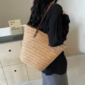 Large handmade straw woven tote bag for beach vacations with brown leather straps - Khaki
