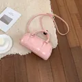 Stylish small pink crossbody pillow bag for women with top handles and gold hardware - Without Pendant / Pink