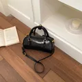 Elegant glossy black pillow style handbag featuring gold hardware for stylish women - Without Pendant / Black