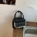 Stijlvolle zwarte handtas voor dames met polkadot flap kantafwerking en strikje - Standaardtype / Zwart