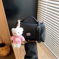 Elegant black pebbled leather crossbody small square bag with cute white teddy bear charm - With Pendant / Black