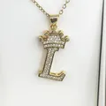 Elegant gold stainless steel letter L necklace featuring a crown and crystal accents - Letter L / Gold