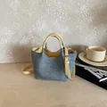 Trendy quilted denim bucket bag with contrasting yellow handles and shoulder strap - Yellow