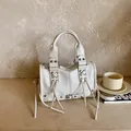 Creamy white motorcycle style handbag with rivet, lacing details and tassels - No Pendant / Off White