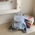 Stylish sweet light blue canvas backpack featuring silver star patterns for women and girls - Standard Type / Blue